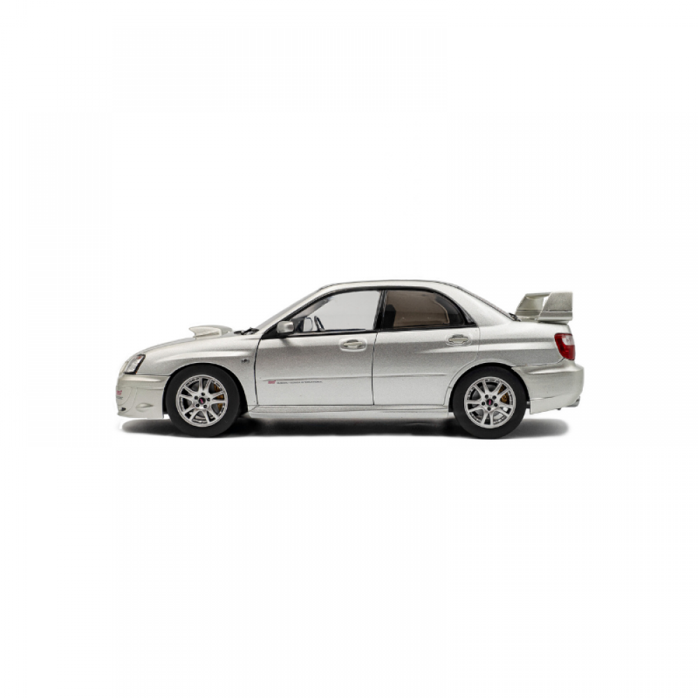 Macheta Subaru Impreza WRX STI Premium Silver Effect 2003 scara 1:18 Solido